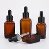 En stock al por mayor botella cuadrada de vidrio ámbar oscuro para aceite esencial de té botella con gotero de aceite esencial botella marrón para esencia