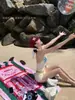 Nuevo traje de baño de dos piezas estilo coreano amarillo con lentejuelas de estrella y cuello halter, bañador tipo boxer adelgazante para chicas calientes en vacaciones en la playa bikini