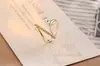 Anillo geométrico de circonita de cobre que no se decolora para mujer, diseño de nicho, lujo ligero, de alta gama, exquisito, moderno y único