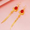 Aretes largos de estilo étnico de imitación calcedonia verde para mujer, aretes de borla de rubí de imitación de oro vietnamita, accesorios transfronterizos