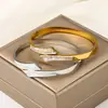 Pulseira Cruzada de Aço Inoxidável Transfronteiriça Banho de Ouro 18k Inlaid com Diamantes Pulseira de Titânio da Moda para Mulheres Joias Atacado