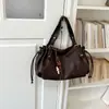 Bolso de mano tipo almohada Boston francés de moda transfronteriza, calidad texturizada, diseño simple vintage, herrajes suaves, gran capacidad