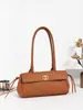 Bolsa baguette estilo Chanel verão 2026 nova com padrão de diamante e textura de lichia, bolsa de mão tipo bowling de couro bovino, bolsa de ombro, bolsa tote