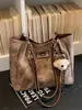 Bolsa de Gran Capacidad Yuezi para Mujer 2026 Primavera Nuevo Estilo Bolsa para Clase de Estudiante Universitario Moda Bolso Tote de Hombro para Viajes