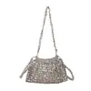 Bolso de Hombro Tejido con Cuentas Hecho a Mano de Lujo Estilo Francés 2025 Verano Diseño Metálico Hueco Bolso Cruzado Versátil para Mujer