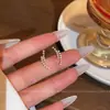 Pendientes de Botón de Circonita Cúbica y Perla de Lujo Ligero para Mujer 2026 Nuevo Estilo Caliente Pendientes Elegantes Diseño de Nicho Joyería para Orejas Única de Gama Alta
