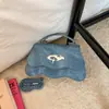 Bolso de hombro moderno y a la moda estilo coreano, nuevo modelo primavera 2026, bolso baguette de nicho casual de alta apariencia y calidad