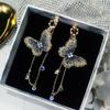 Pendientes de Borla con Perla de Imitación de Mariposa de Moda Elegantes de Venta Caliente Estilo Coreano Distintivos Creativos de Gama Alta Largos Versátiles