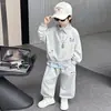 Conjunto para Niños Estilo Coreano Sudadera Falso Dos Piezas Ropa Guapa para Niños 2026 Nueva Ropa de Otoño para Bebé Pantalones Deportivos Casuales Modernos