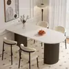 Mesa de isla semicircular con tapa de losa de roca, sillas de comedor, juego para uso doméstico, diseño simple de lujo ligero moderno italiano, adecuado para apartamentos pequeños, mesa de comedor de moda