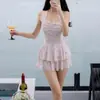Traje de baño de una pieza estilo nuevo 2026 para mujer, Verano Sexy Estilo Falda Floral Conservador para Ocultar el Vientre Adelgazante de Cuello Halter Ropa de Baño para Estudiantes de Aguas Termales