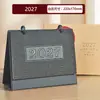 Calendario 2027 Estilo Chino Estampado en Caliente Calendario Mensual Adorno de Escritorio Creativo Anillado Tarjeta Perforada Planifica el Calendario de Hoy Logo Personalizado