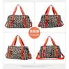 2023 nueva bolsa de viaje de gran capacidad para hombre y mujer, bolso de mano con separación húmeda y seca, bolsa deportiva Oxford para Fitness, venta al por mayor