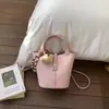 Bolso Pequeño de Cuero Suave con Patrón de Lichi para Mujer 2026 Nuevo Estilo Bolso Cesta de Mano Bolso Cubo Bolso Cruzado Retro de Primavera