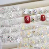 Adesivos de Nail Art Temáticos de Natal Patches Decorativos Árvore de Natal Laço Floco de Neve Padrão Feriado Adesivos Adesivos para Unhas 3D