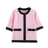 Top de punto elegante para mujer, estilo europeo y americano transfronterizo, nuevo en 2026, al por mayor, con bloques de color, de manga corta, de un solo pecho 1822016