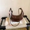 Bolsa feminina de nicho, requintada e moderna, novo estilo verão 2026, bolsa transversal versátil, bolsa de ombro fashion, bolsa de axila estilo "bolinho".