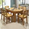 Juego de mesa de comedor hecho de madera maciza, combinación de mesa y sillas de comedor modernas y sencillas, mesa de comedor redonda de madera maciza para uso doméstico, mesa de comedor de estilo chino nuevo
