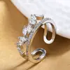 Anillo abierto de doble capa con circonita incrustada, corona de moda, temperamento de chica, nicho personalizado, joyería irregular creativa al por mayor