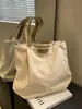 Bolso de lona casual de gran capacidad transfronterizo de Amazon para mujer, color liso, adecuado para estudiantes universitarios, para ir al trabajo y como bolso de hombro tote