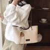 Bolsa de mão grande e moderna para mulheres 2026 novo modelo simples bolsa tote de moda diária bolsa de ombro de grande capacidade moderna