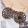 Aretes de madera más vendidos de comercio electrónico transfronterizo, moda europea y americana, aretes de madera geométricos huecos exagerados hechos a mano