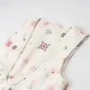 Suministro directo de fábrica al por mayor para comercio exterior chaleco sin mangas con estampado fresco y escote en V profundo para mujer primavera 2025 nueva moda