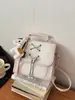 Bolsas de mujer de alta gama transfronterizas, nueva colección primavera 2026, mochila de estilo preppy a la moda, mochila ligera para viajes y desplazamientos