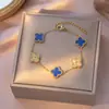 Collar Popular Transfronterizo de Trébol de Cuatro Hojas de Acero de Titanio para Niñas, Lujo Ligero y Versátil Nuevo Conjunto de Cadena Clavicular de Cinco Flores de Doble Cara