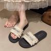 Zapatillas planas versátiles estilo tweed para mujer, para verano, para uso exterior, 2025, nueva moda, francesas, de una línea, con pedrería, zapatillas de playa