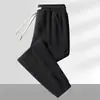Pantalones de chándal de pana para hombre para otoño, pantalones casuales de retazos, corte holgado, pantalones jogger versátiles y modernos, pantalones largos para hombre