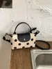 2026 Nuevo Estilo Fresco Lunares Personalidad Elegante Patchwork Bolso de Hombro Relajado Bolso Cubo Moderno Bolso de Hombro para Viajes