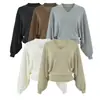 Top de punto blanco con cuello en V y mangas murciélago para mujer, nuevo diseño otoño/invierno, elegante, adelgazante, versátil y perfecto como capa interior