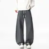 Calças masculinas 2026 primavera e outono jeans sintético calças de moletom de perna larga calças esportivas calças retas largas calças casuais de primavera