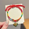Pulsera de Hilo Rojo de Bebé de Dibujos Animados 2026 Nuevo Estilo Bendición Pequeño Zongzi Pulsera Estilo Chino Festival del Bote del Dragón Hilo de Cinco Colores Ajustable Venta al por Mayor