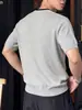 Directo de fábrica, camisa de punto para hombre estilo old money, manga corta, cuello redondo, corte holgado, jacquard, transpirable, top fino de verano