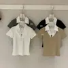 Wgwe10199 Ropa de Mujer Guangzhou Shisanxing Verano Nuevo Cuello en V Bloque de Color Falso Dos Piezas Manga Corta Camiseta Top