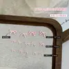 Arte de Uñas Decoraciones de Moño Coloridas Mini Resina Moderna Francesa Dopamina Accesorios para Uñas Mate Mayoreo
