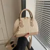 Bolsa feminina elegante e simples, bolsa transversal de ombro único casual para mulheres, nova bolsa de mão estilo concha versão coreana primavera 2026