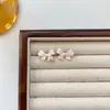Pendientes de Esmalte con Lazo Estilo Francés para Mujer, Nicho de Lujo Ligero Estilo Ins, Sensación de Alta Gama, Nuevos Pendientes Versátiles