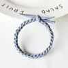 Moda feminina da Coreia do Sul combinação de cores popular faixa de cabelo versátil Corda de cabelo simples corda de cabelo grossa espiral multicolorida pulseira de faixa de cabelo com nós