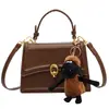 Bolso Pequeño Texturizado para Mujer Primavera y Verano 2023 Nuevo Bolso de Hombro Cruzado de Moda Popular en Internet Bolso Cuadrado Pequeño Portátil