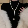 Nuevo collar de perlas artificiales de doble capa, cadena para la clavícula de moda exquisita transfronteriza, cadena de suéter de lujo ligero estilo francés