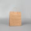 Bolsa de papel Kraft de fábrica con impresión de logo, bolsa de regalo portátil, impresión de café, empaque para compras de ropa, bolsa de papel Kraft