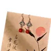 ¡El Encanto del Nuevo Estilo Chino! Pendientes de Cinabrio Xiangyun para Mujer, Gama Alta, Lujo Accesible, Pendientes de Nicho, Pendientes, Pinzas para Orejas sin Perforar
