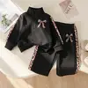 Ropa Infantil para Niñas Transfronteriza Rusa Primavera y Otoño Nuevo Conjunto de Dos Piezas Chaqueta de Manga Larga con Cuello Alto + Pantalones Casual Cálido al por Mayor