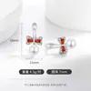 Transmisión en vivo súper ventas nuevos aretes de perla con moño estilo coreano moda personalidad versátiles aretes de perla sintética dropshipping