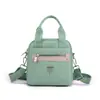 Bolsa Feminina Novo Estilo Simples Versátil Bolsa de Ombro Feminina Leve Bolsa de Mão para o Trabalho Nylon Bolsa Feminina Tendência Bolsa Transversal Atacado