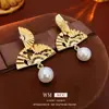 Brincos Vintage de Aço com Argola Gota Olho de Gato para Mulheres, Estilo Retrô com Toque de Luxo, Acessórios de Orelha Versáteis e da Moda