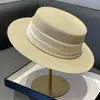 Elegante Chapéu de Palha com Topo Plano Estilo Francês 2026 Novo Chapéu de Sol de Palha Elegante com Pérolas para Mulheres